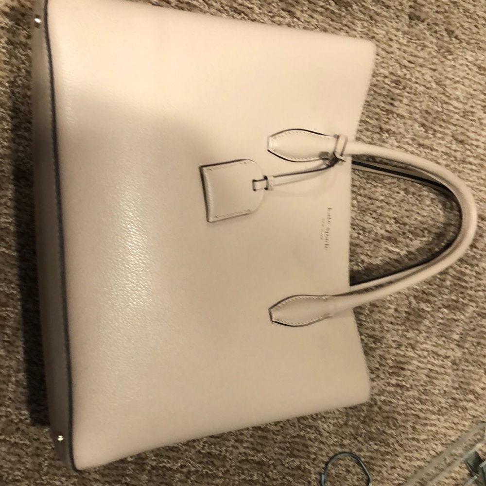 Kate Spade bag, blush pink with brown interior. Hang tag with KS heart.